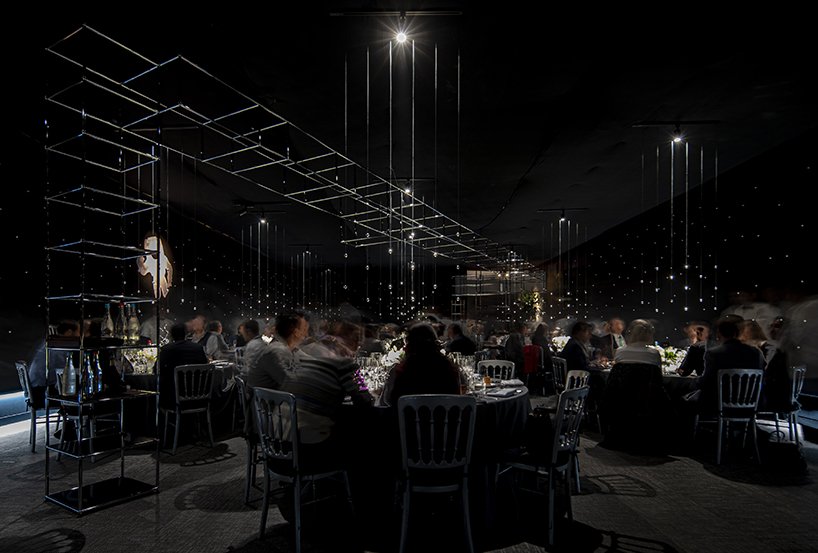 chain + siman designs 'gravity' restaurant based on the visual minimalism of alfonso cuaron designboom