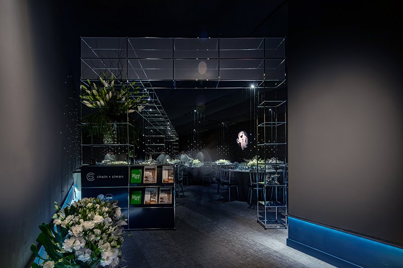 chain + siman designs 'gravity' restaurant based on the visual minimalism of alfonso cuaron designboom