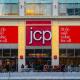 a sign above a store: J.C. Penney joins Macy's and Pier 1 announcing that it's closing more stores in April 2020