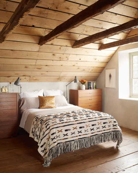 attic bedroom with wooden ceiling