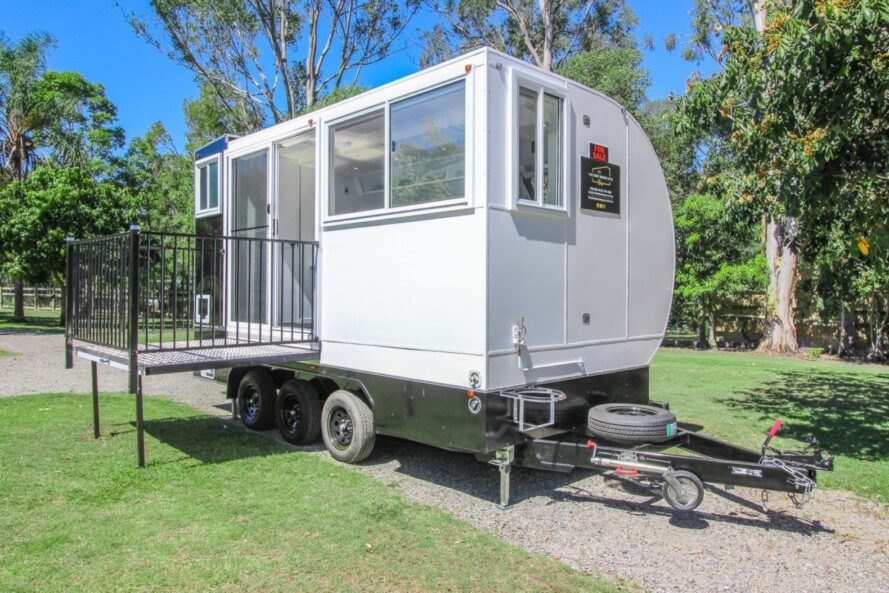small white camper on wheels