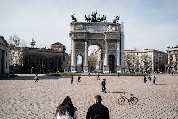 Despite calls from the authorities to stay at home, some people spent the day outside in Milan on Sunday. 