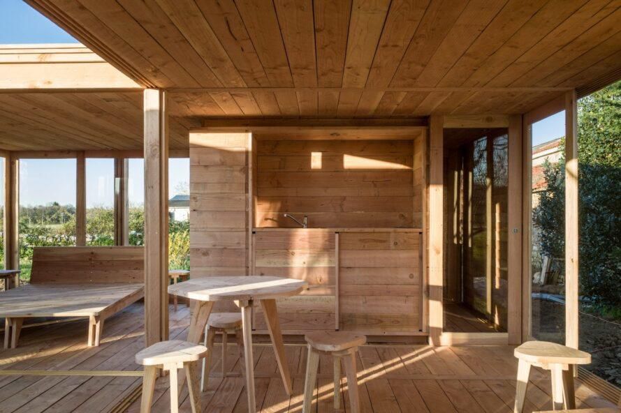 Kitchen clad in light timber