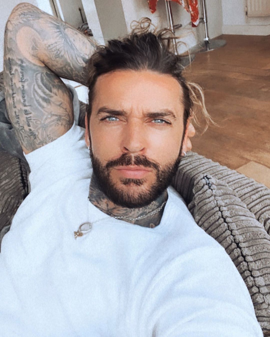 Inside MasterChef star Pete Wicks' Essex home with minimalist interiors and patio swing for his two rescue dogs
