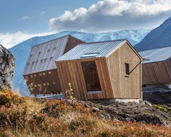 snøhetta builds pentagonal hiking cabins to overlook a glacier in norway