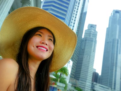 A staycationer in a sun hat