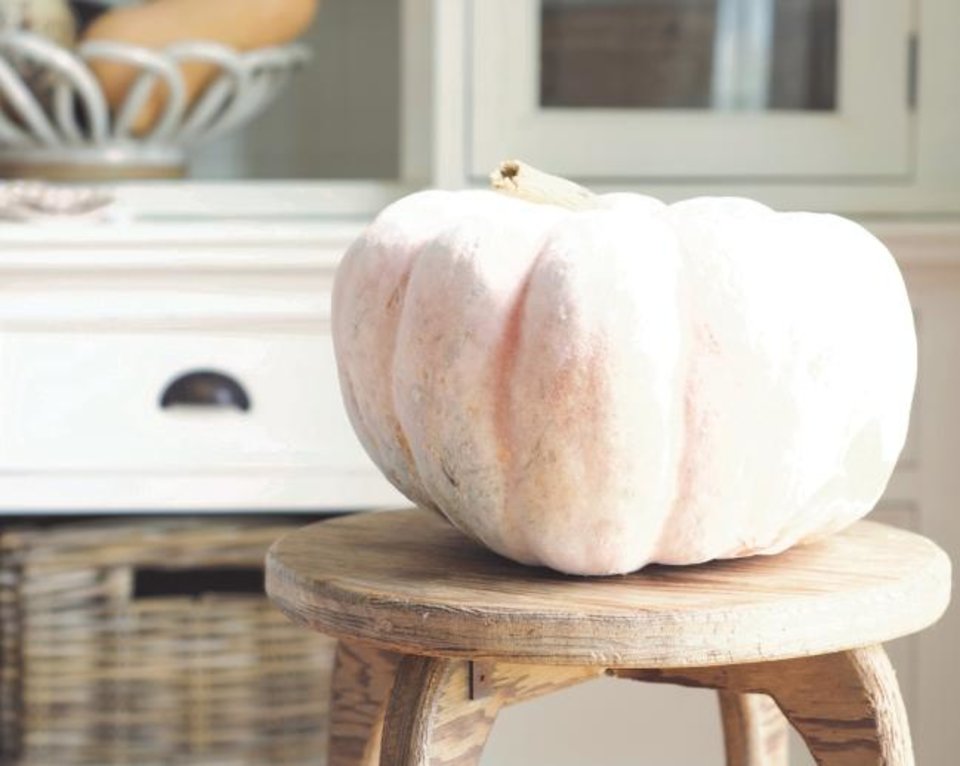 Photo - When decorating for the season, don’t rely on factory-made pretend decor, Welcome Home author Myquillyn Smith says. This fall, instead of a dozen plastic pumpkins, make a statement with one big, quirky real pumpkin. [Photo provided/Myquillyn Smith] 