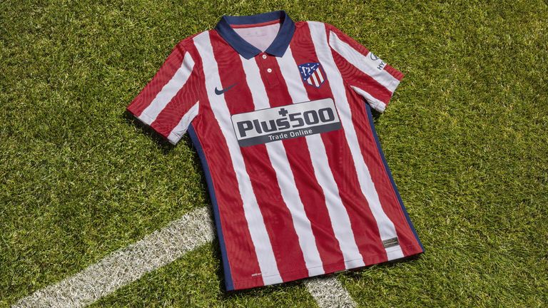 Atletico Madrid's home kit features traditional red and white stripes with a twist