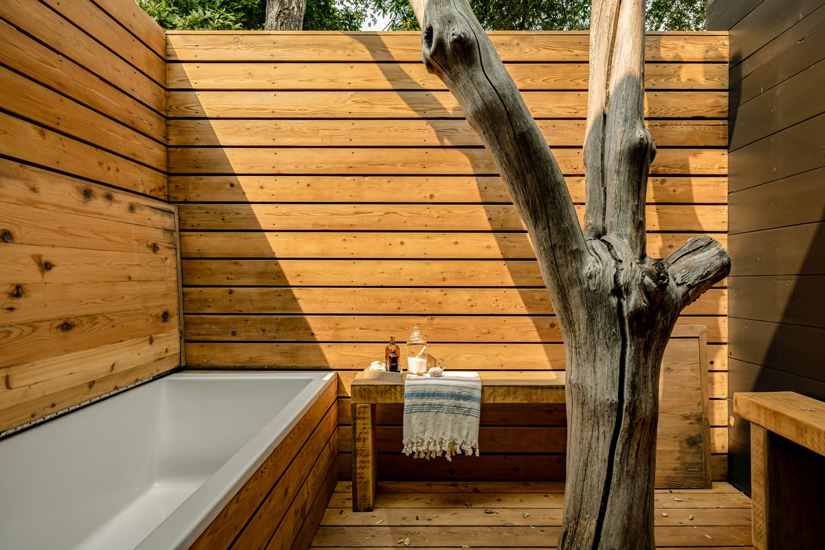 Tub wrapped in wood.