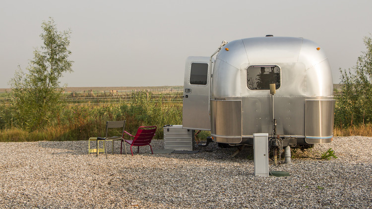 Example of an Airstream Trailer used as a Tiny House in the Netherlands. Image © HildaWeges Photography / Shutterstock