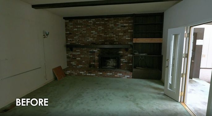 This fireplace is large and dated.