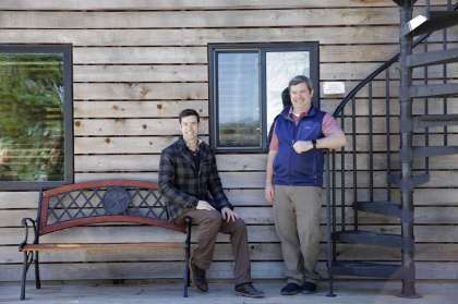 Amos and Kenneth Wheeler stand outside one of the the home built by Cargo Homes and run by VillaStays in Waco, Texas on Wednesday, Feb. 26, 2020.